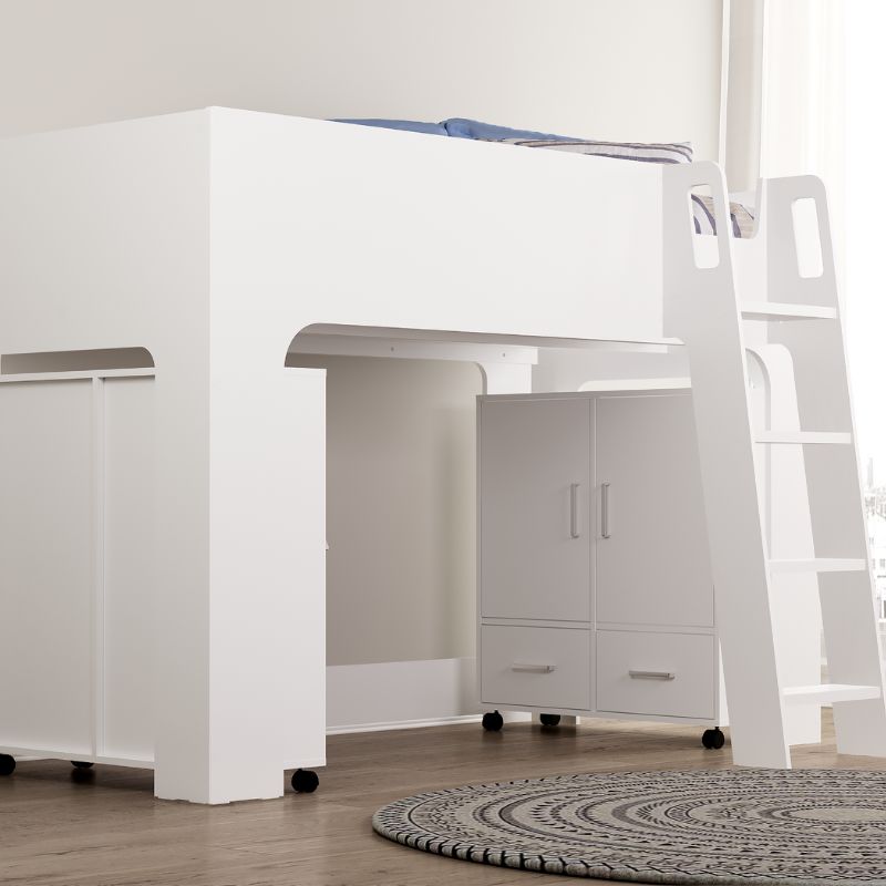White children's bed with desk and storage drawers in a room setting.
